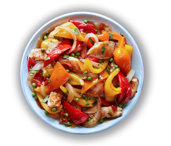 A colorful stir-fry dish featuring sliced red, yellow, and orange bell peppers mixed with chicken pieces, onions, and green peas on a white plate. The vibrant ingredients are tossed together, creating a fresh and appetizing appearance. GREENHOUSE Goodness A colorful stir-fry dish featuring sliced red, yellow, and orange bell peppers mixed with chicken pieces, onions, and green peas on a white plate. The vibrant ingredients are tossed together, creating a fresh and appetizing appearance. GREENHOUSE Goodness