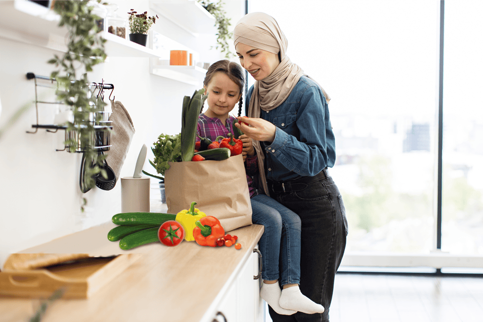 A woman in a hijab and a young girl unpack fresh greenhouse vegetables from a paper bag in a bright, modern kitchen with large windows and lush green plants. GREENHOUSE Goodness
